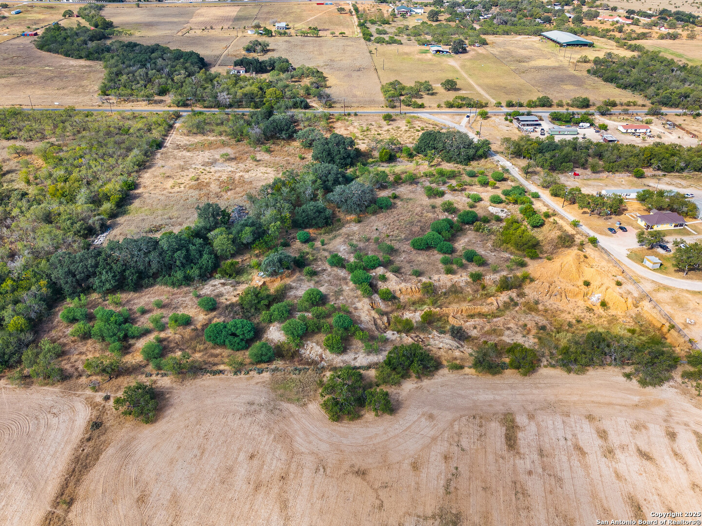 17520 Jackel Road Von Ormy, TX 78073 - Photo 7 of 8 an aerial view of residential houses with outdoor space