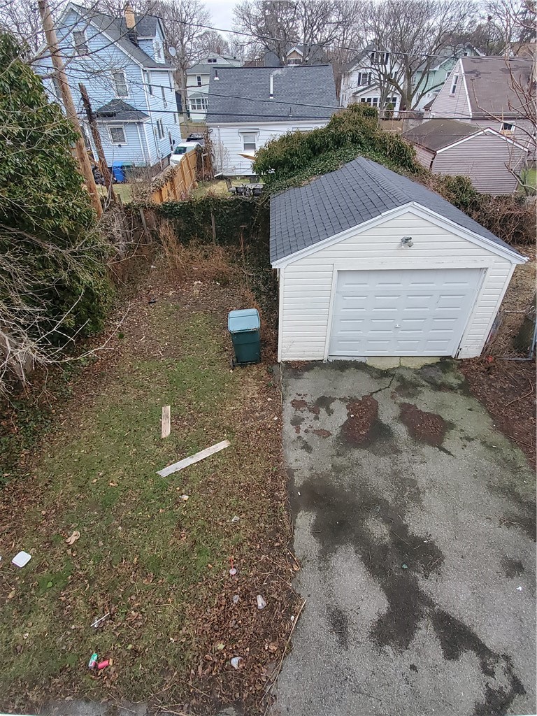 21 Manitou Street Rochester, NY 14621 - Photo 20 of 28 Backyard with garage