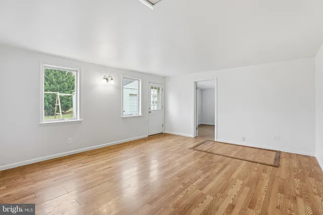 an empty room with windows