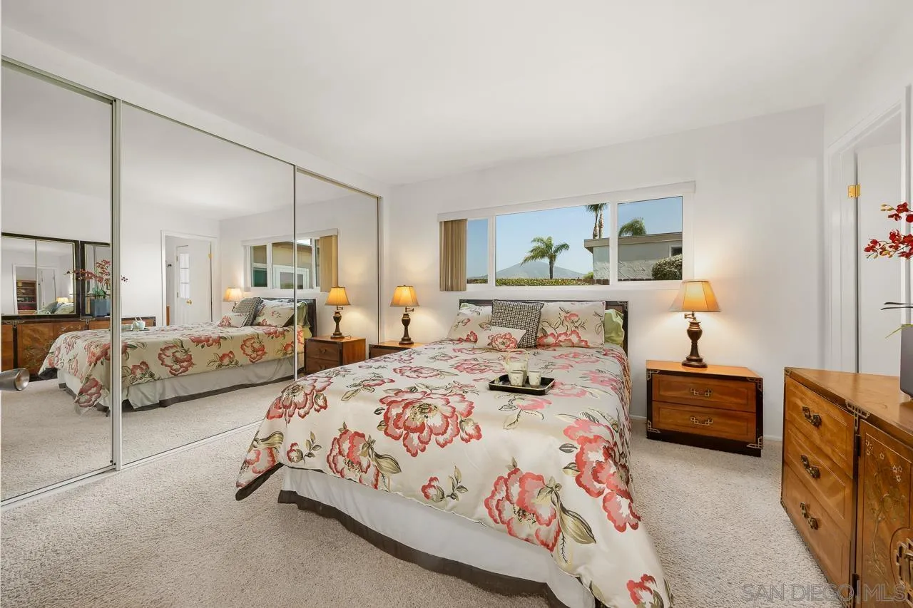 2711 South Barcelona Street Spring Valley, CA 91977 - Photo 19 of 38 a bedroom with two beds and painting on the wall