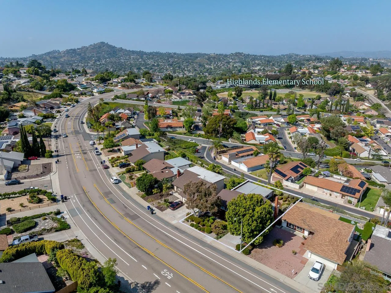 2711 South Barcelona Street Spring Valley, CA 91977 - Photo 34 of 38 an aerial view of residential houses with outdoor space