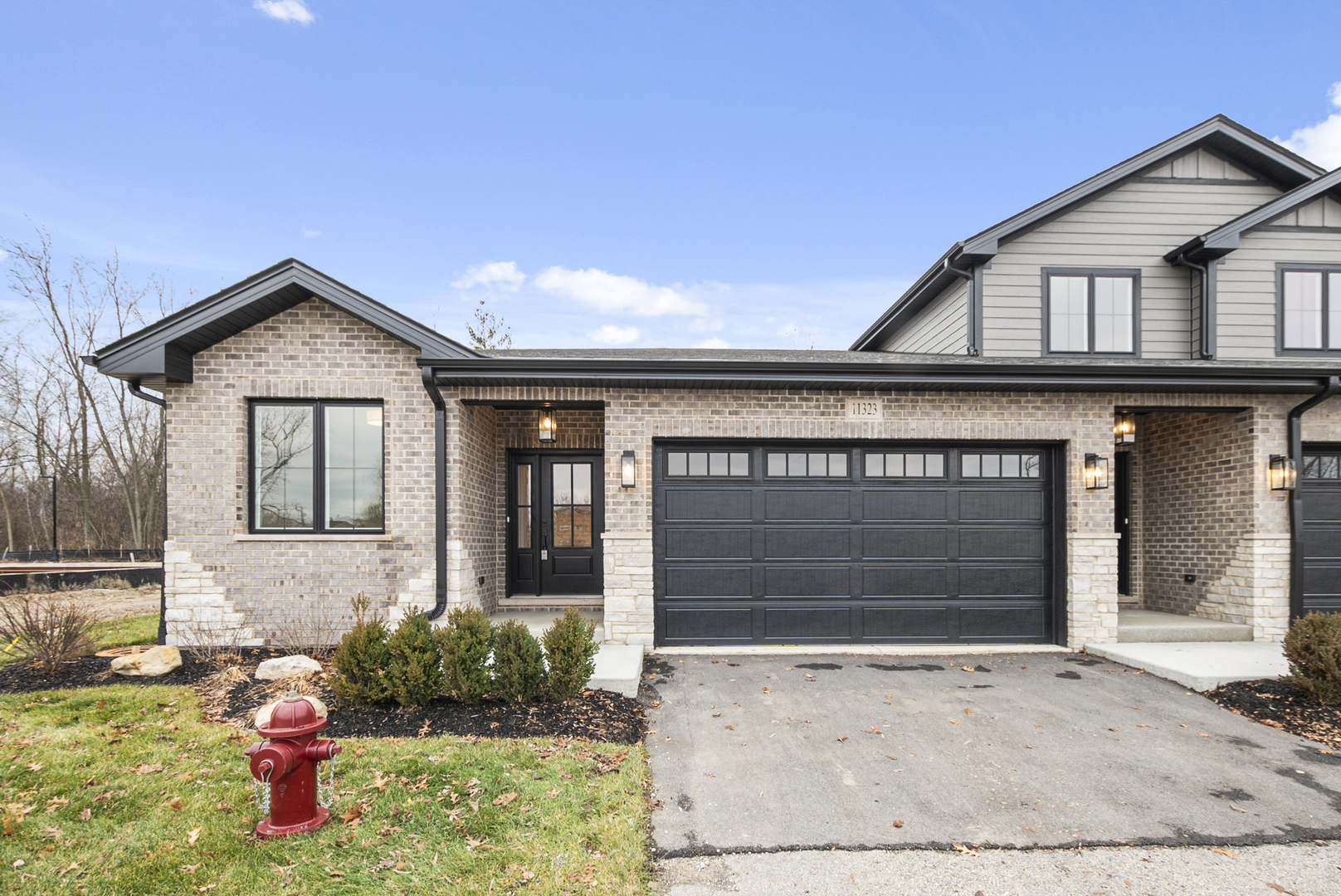 11323 1st Street Mokena, IL 60448 - Photo 26 of 26 a front view of a house with a yard and garage