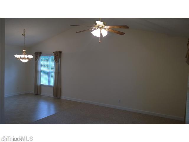 130 Baxter Road Winston-Salem, NC 27107 - Photo 3 of 16 Living Room. Cathedral ceiling in the living room, kitchen and dining room.