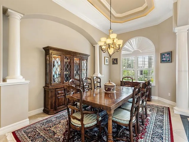 a living room with lots of furniture and white walls