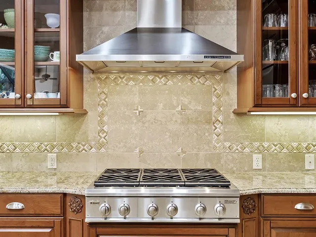 a bedroom with a bed couch and window