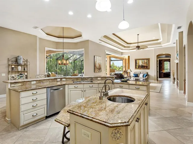 a bedroom with furniture and a flat screen tv