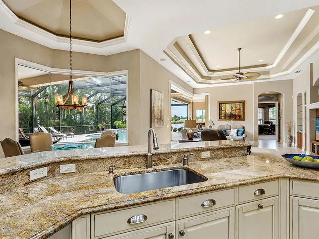 a large spacious bathroom with a large tub shower and sink