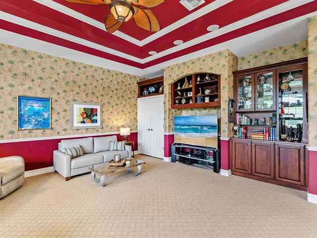 a view of a swimming pool with a patio