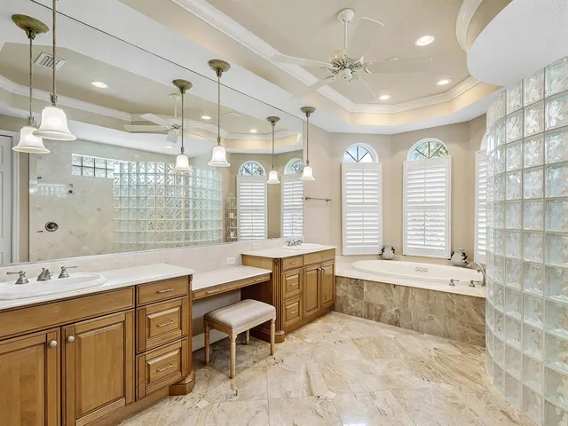 an aerial view of a house with a yard and a garage