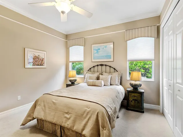 an aerial view of residential house with outdoor space and lake view