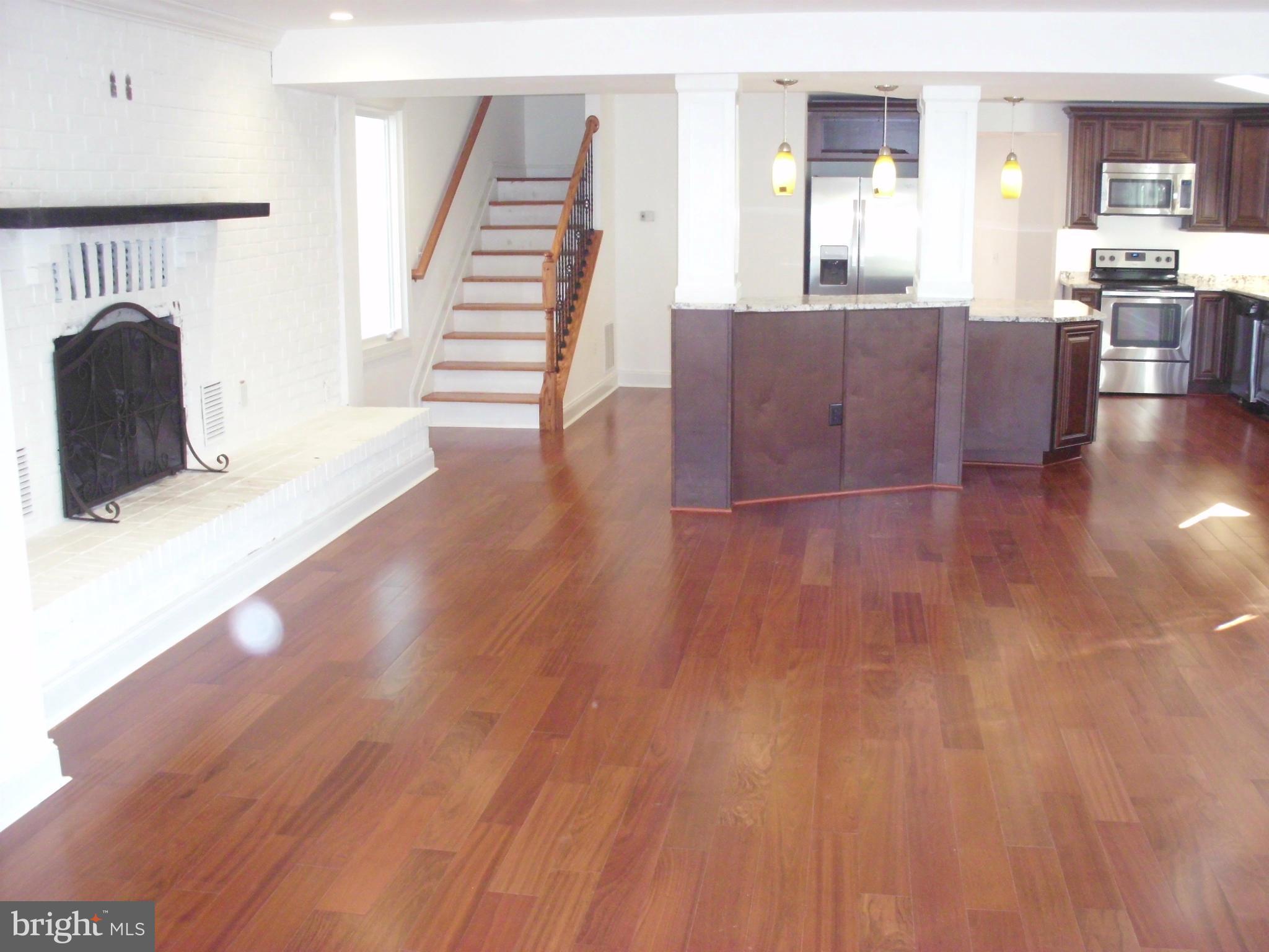 7988 West Riverside Drive Pasadena, MD 21122 - Photo 16 of 30 Living Room to New Kitchen View