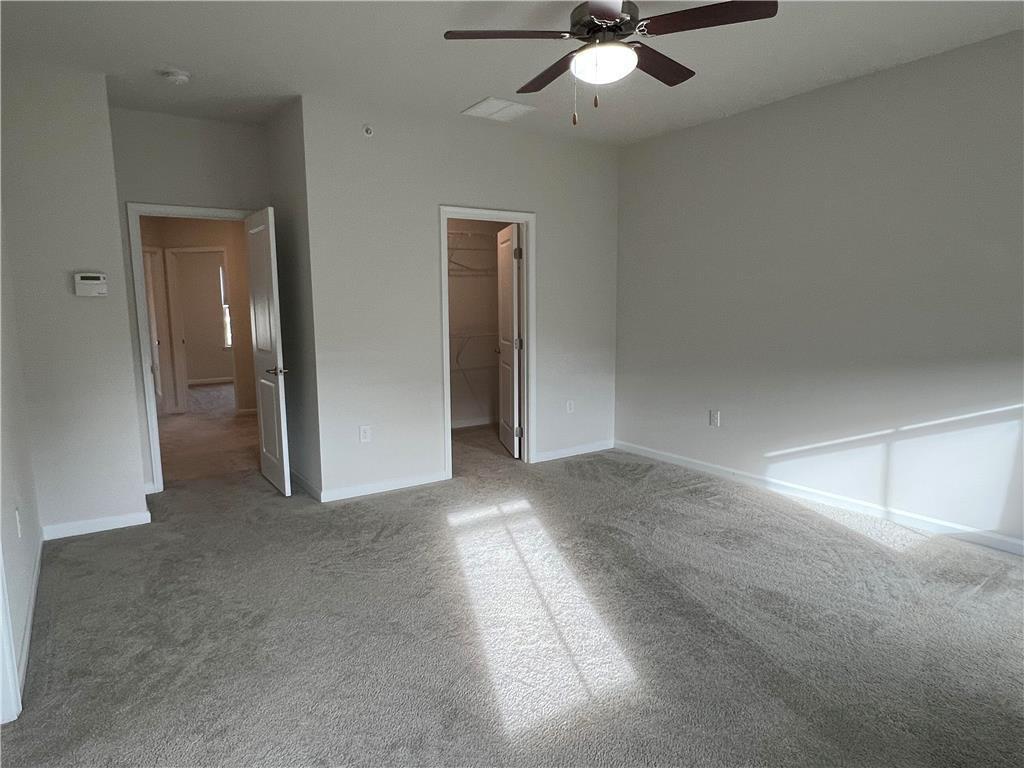 2356 Raya Way Easton, PA 18045 - Photo 11 of 28 Soft carpeting pairs with neutral walls in this comfortable bedroom featuring a walk-in closet.