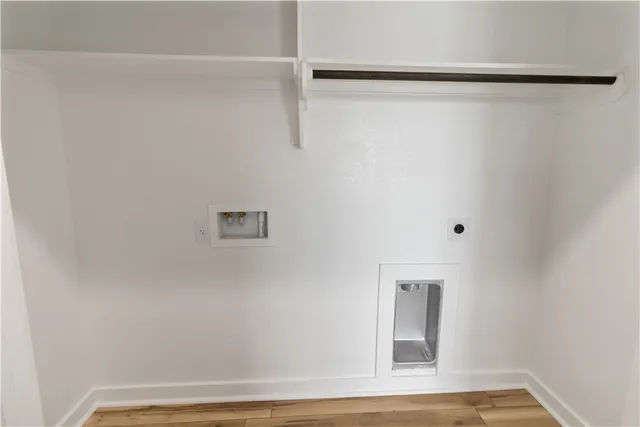 a view of a hallway with closet and closet