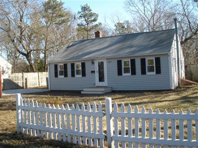 137 Baxter Road Hyannis, MA 02601 - Photo 1 of 9 a view of a house with a small yard