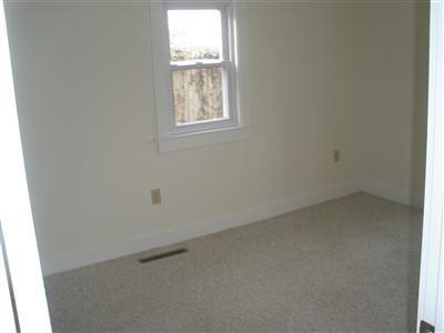 137 Baxter Road Hyannis, MA 02601 - Photo 7 of 9 an empty room with a window