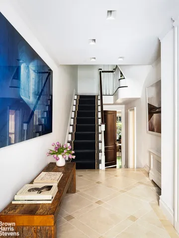 a kitchen with stainless steel appliances a sink stove top oven and cabinets