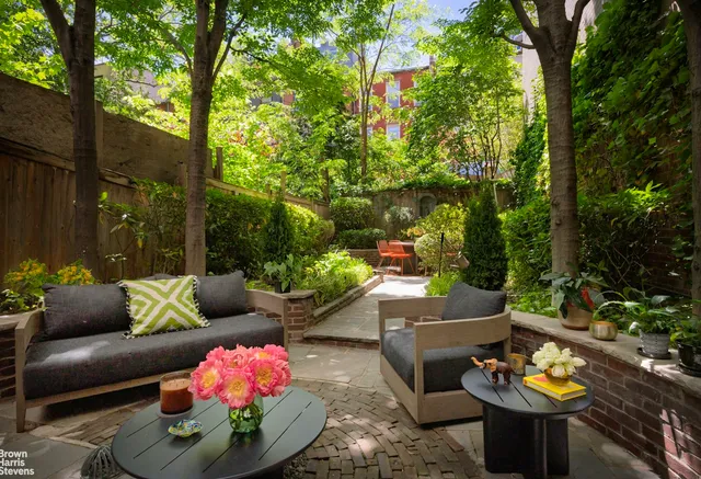 a view of yard with patio