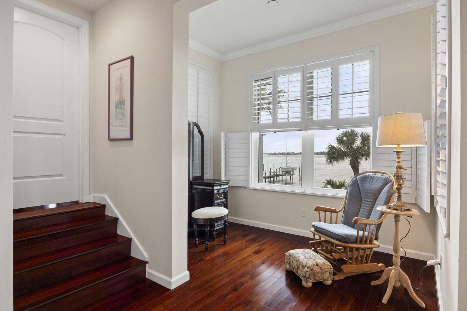 1009 Northwest Terrace Road Stuart, FL 34994 - Photo 30 of 69 a living room with furniture and a window
