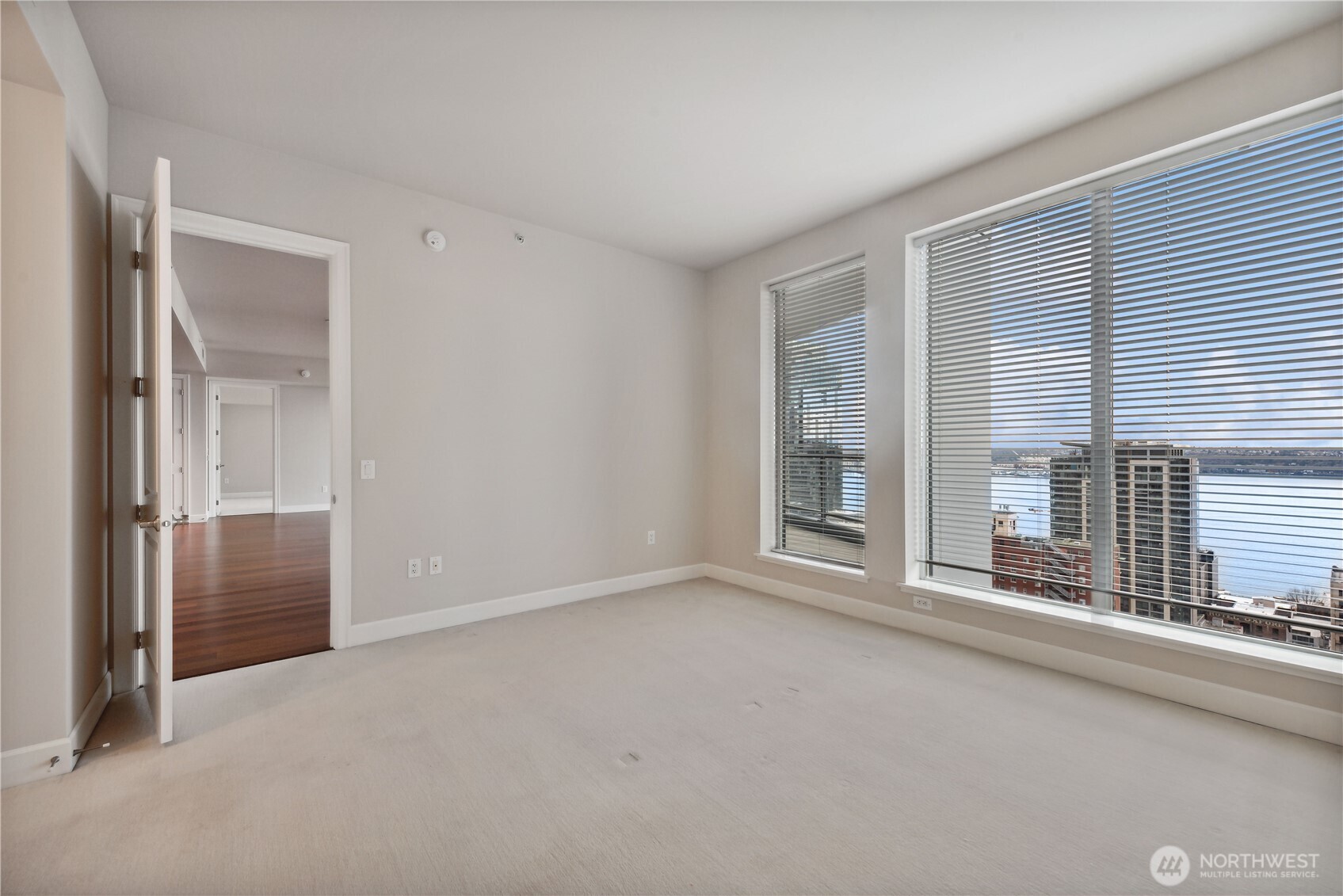 1920 4th Avenue, Unit 2702 Seattle, WA 98101 - Photo 20 of 40 an empty room with windows