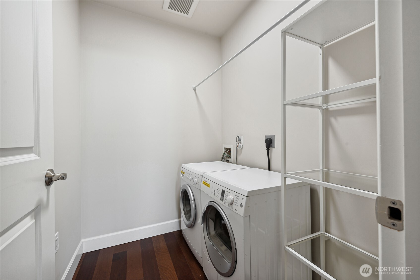 1920 4th Avenue, Unit 2702 Seattle, WA 98101 - Photo 26 of 40 a utility room with dryer and washer