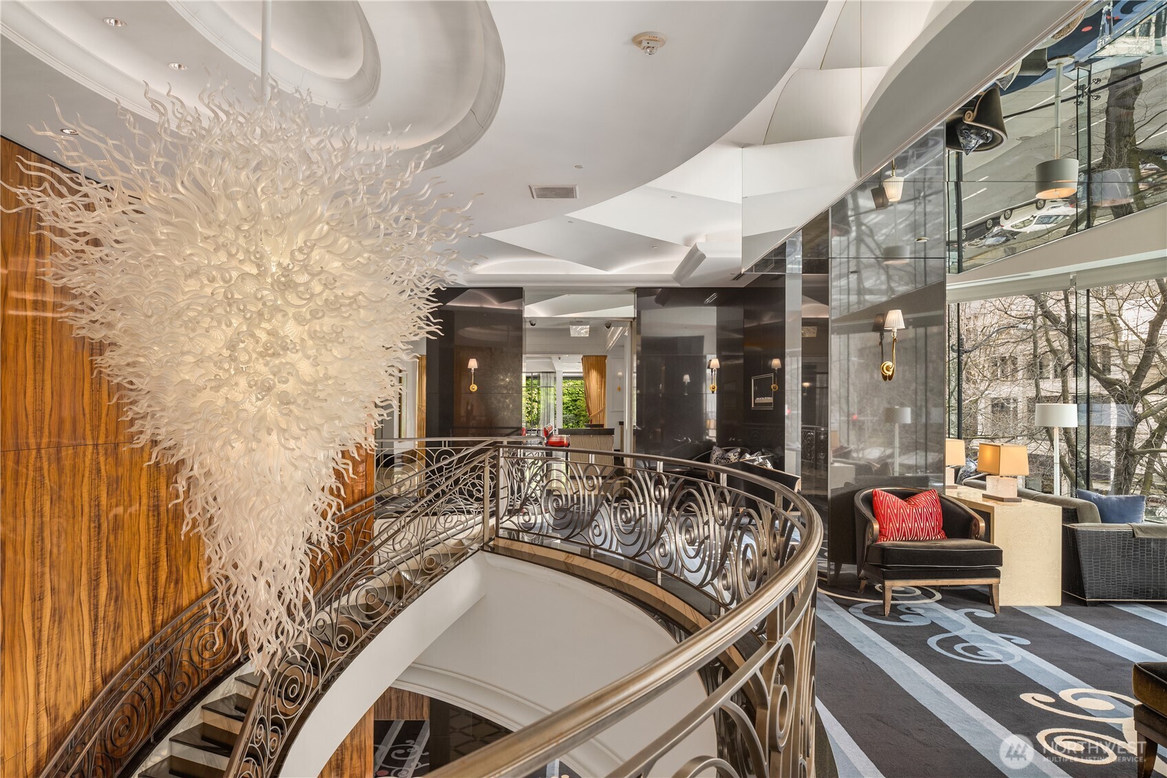 1920 4th Avenue, Unit 2702 Seattle, WA 98101 - Photo 34 of 40 a view of a patio with table and chairs