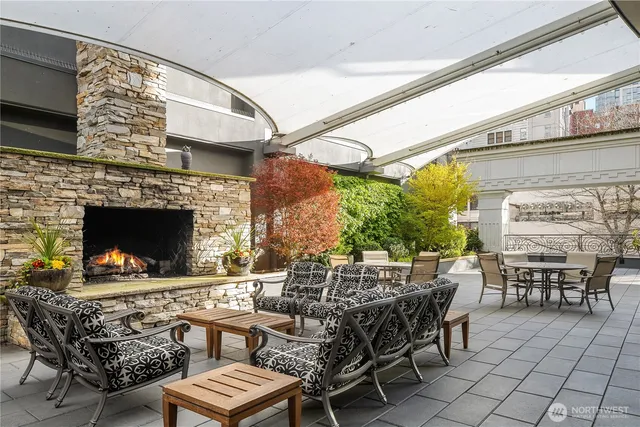 a view of a livingroom with furniture and a fireplace