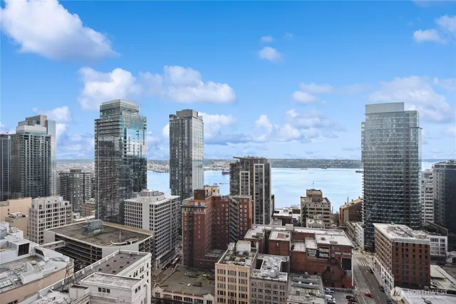 a view of city with tall buildings