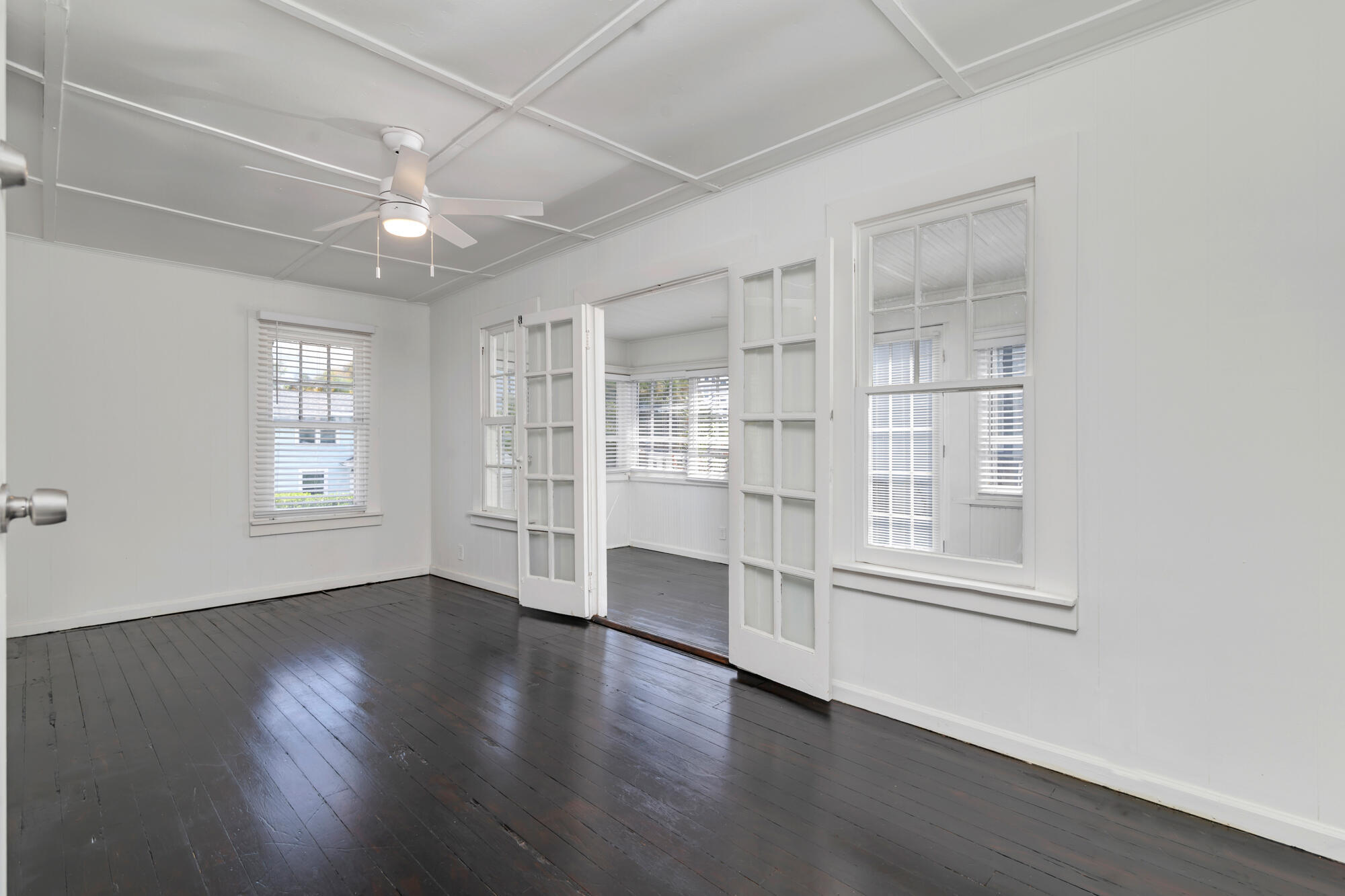 204 Conniston Road, Unit UPSTAIRS APARTMENT West Palm Beach, FL 33405 - Photo 3 of 14 Living Room to Florida Room