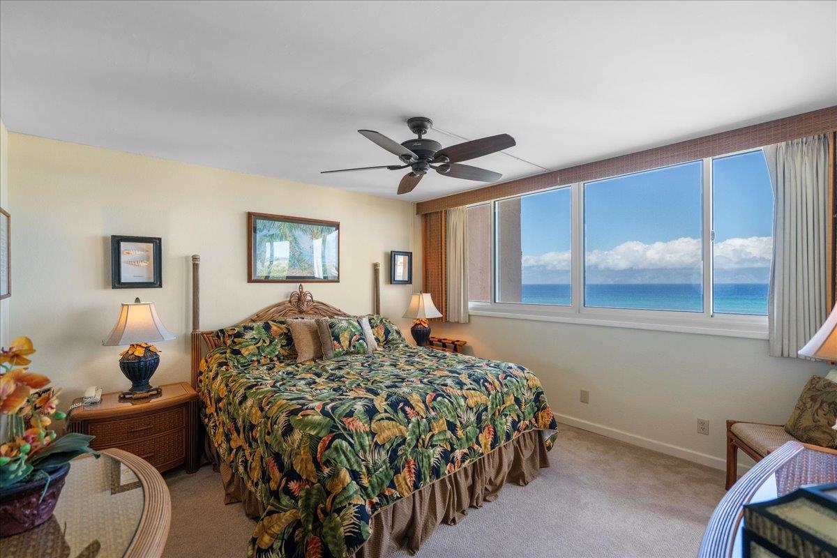 4365 Lower Honoapiilani Road, Unit 907 Lahaina, HI 96761 - Photo 14 of 23 a bedroom with a bed and window