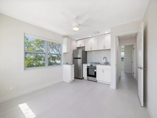 an empty room with windows