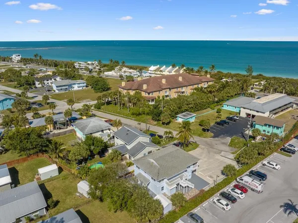 an aerial view of a building with outdoor space