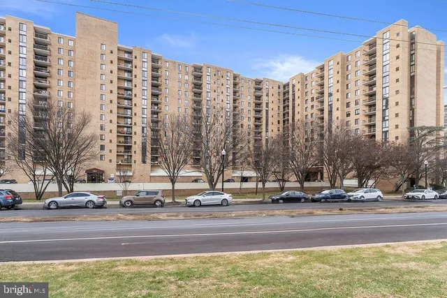 a building with trees in front of it