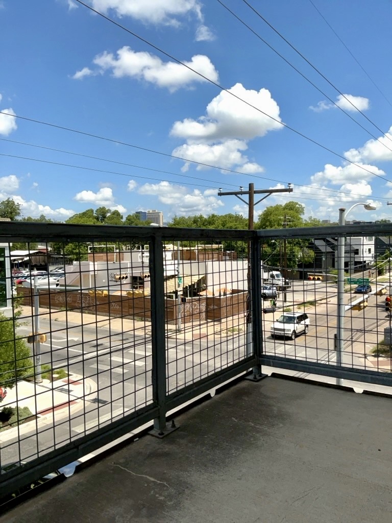 1601 East Cesar Chavez Street, Unit 306 Austin, TX 78702 - Photo 16 of 19 a view of a swimming pool outdoor seating