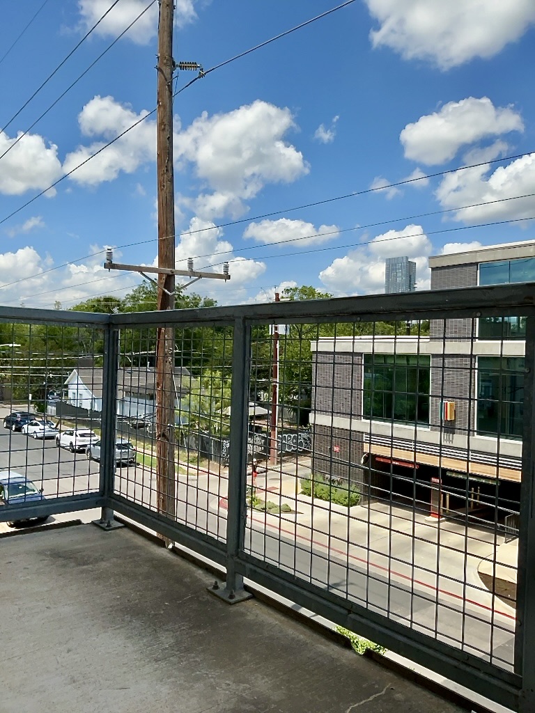 1601 East Cesar Chavez Street, Unit 306 Austin, TX 78702 - Photo 18 of 19 a view of a backyard