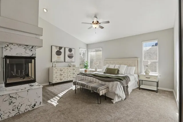 a bed room with bed and a window