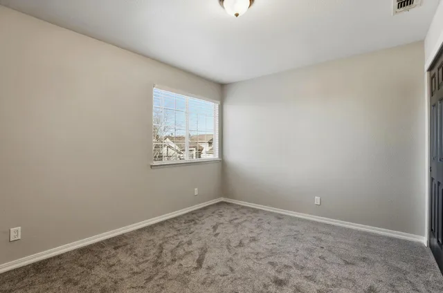 an empty room with a workbench