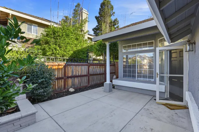 a view of backyard with green space