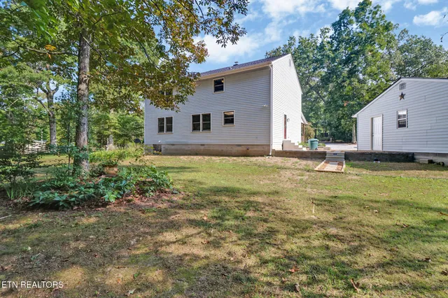 a house view with a garden space