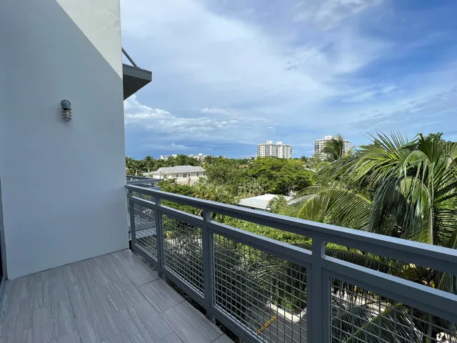 a swimming pool with outdoor seating