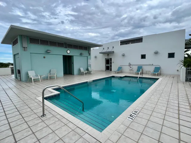 a view of balcony with furniture