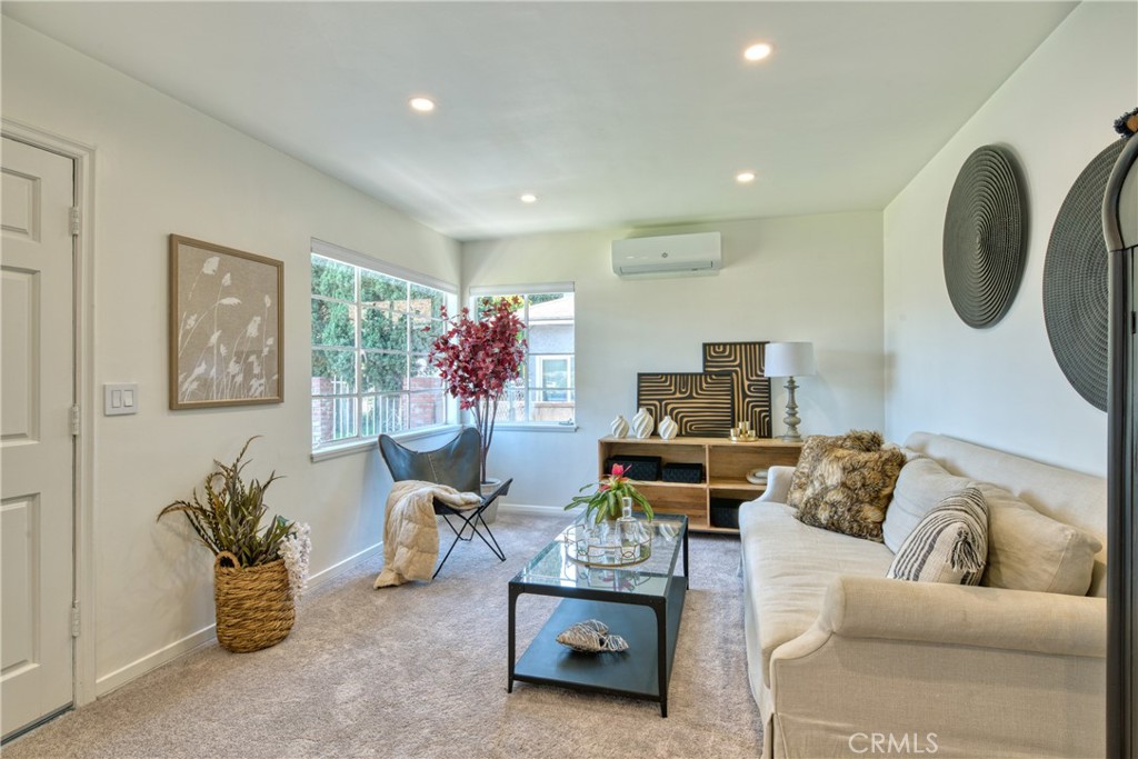 2531 Calmia Road Duarte, CA 91010 - Photo 7 of 30 a living room with furniture and a potted plant