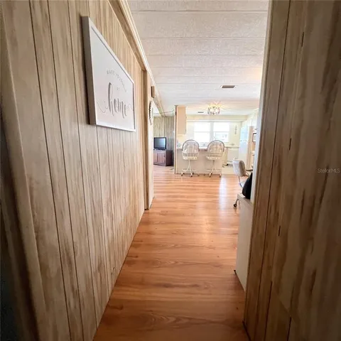 a hallway with a large window