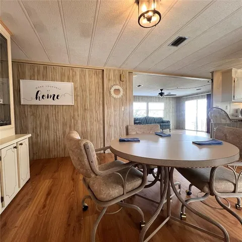 a view of a dining room with furniture
