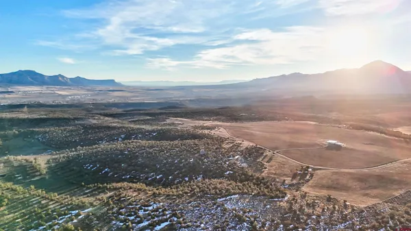 a view of an outdoor space and mountain view