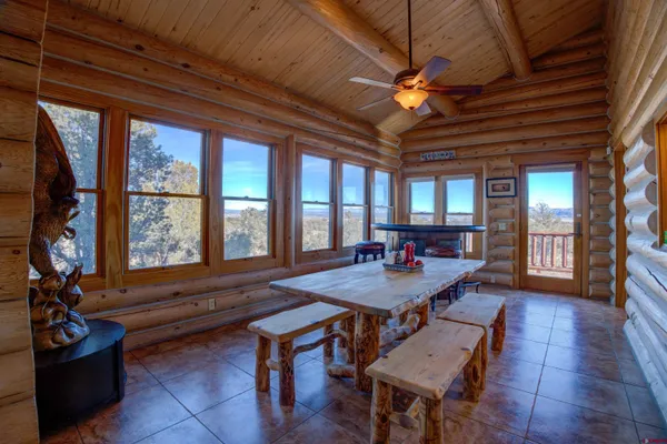 a room with furniture and wooden floor