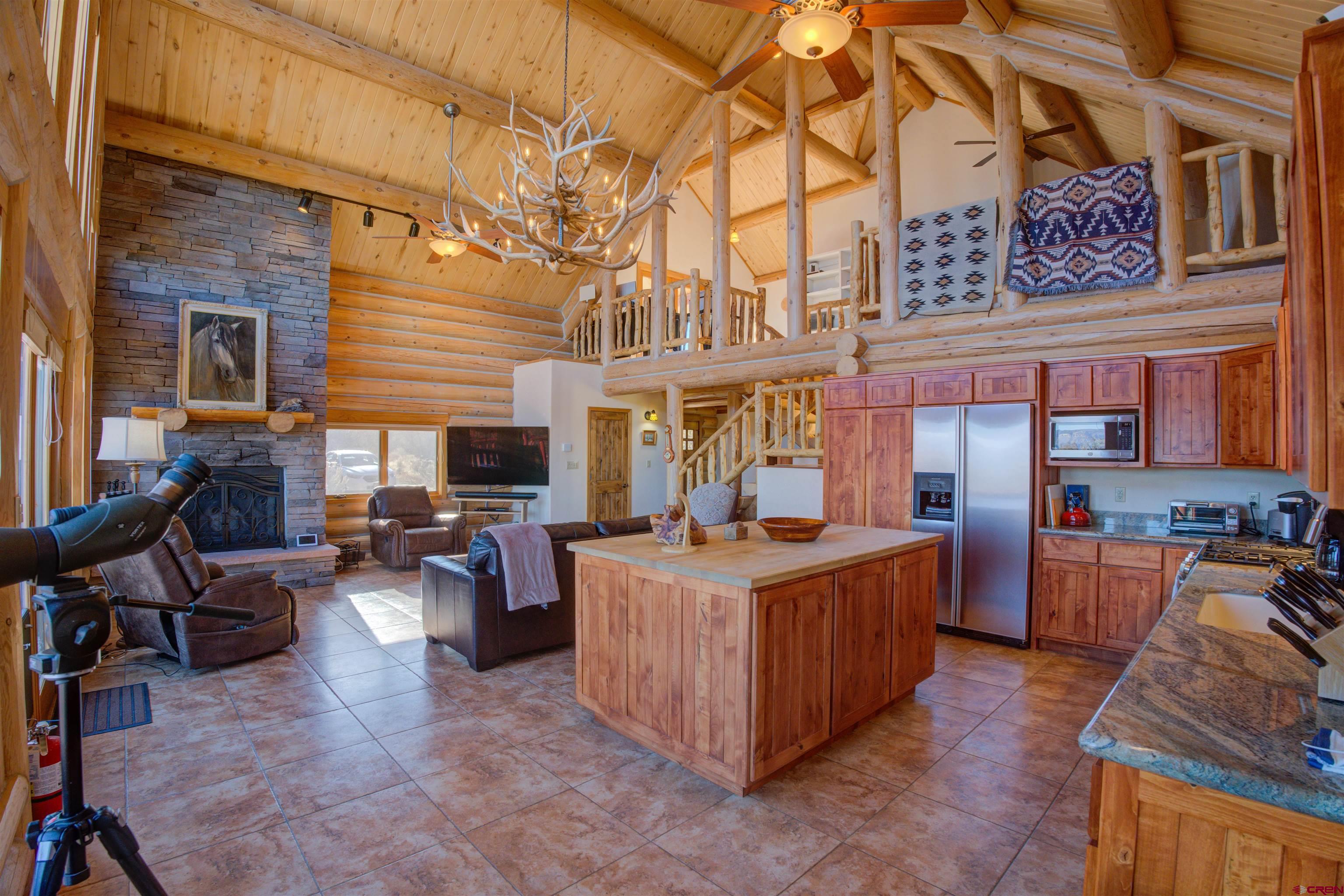 9619 Pueblo Ruins Road Cortez, CO 81321 - Photo 23 of 40 a view of a patio with dining table and chairs