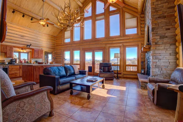 a outdoor space with patio furniture and a fireplace