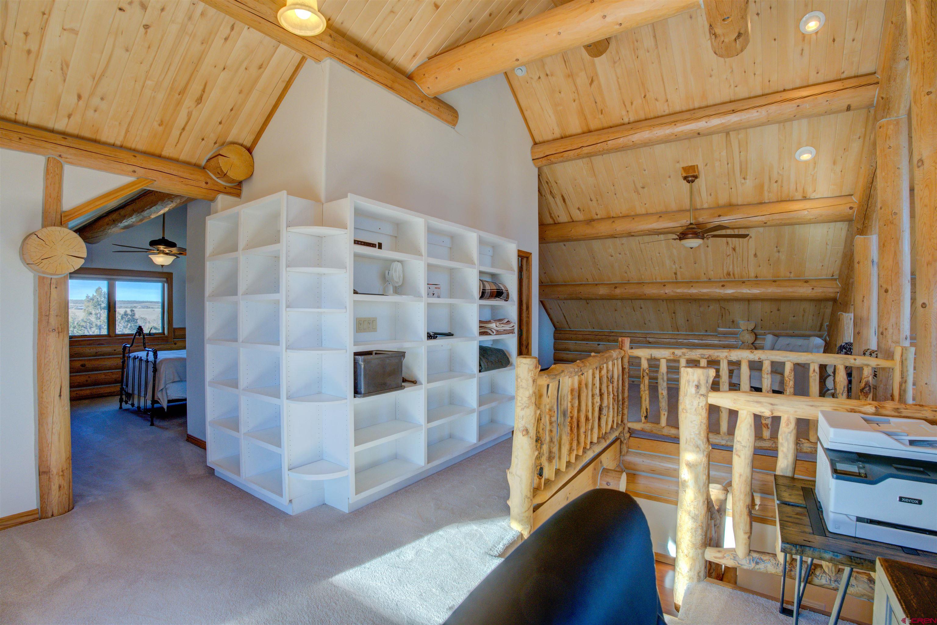9619 Pueblo Ruins Road Cortez, CO 81321 - Photo 33 of 40 a view of entry way with wooden cabinet