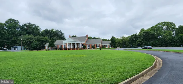a house view with a garden space