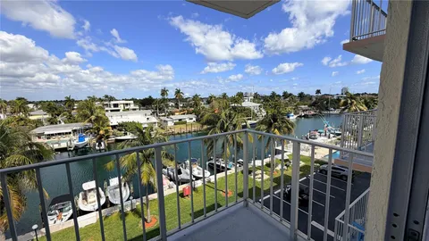 a view of a balcony with city view